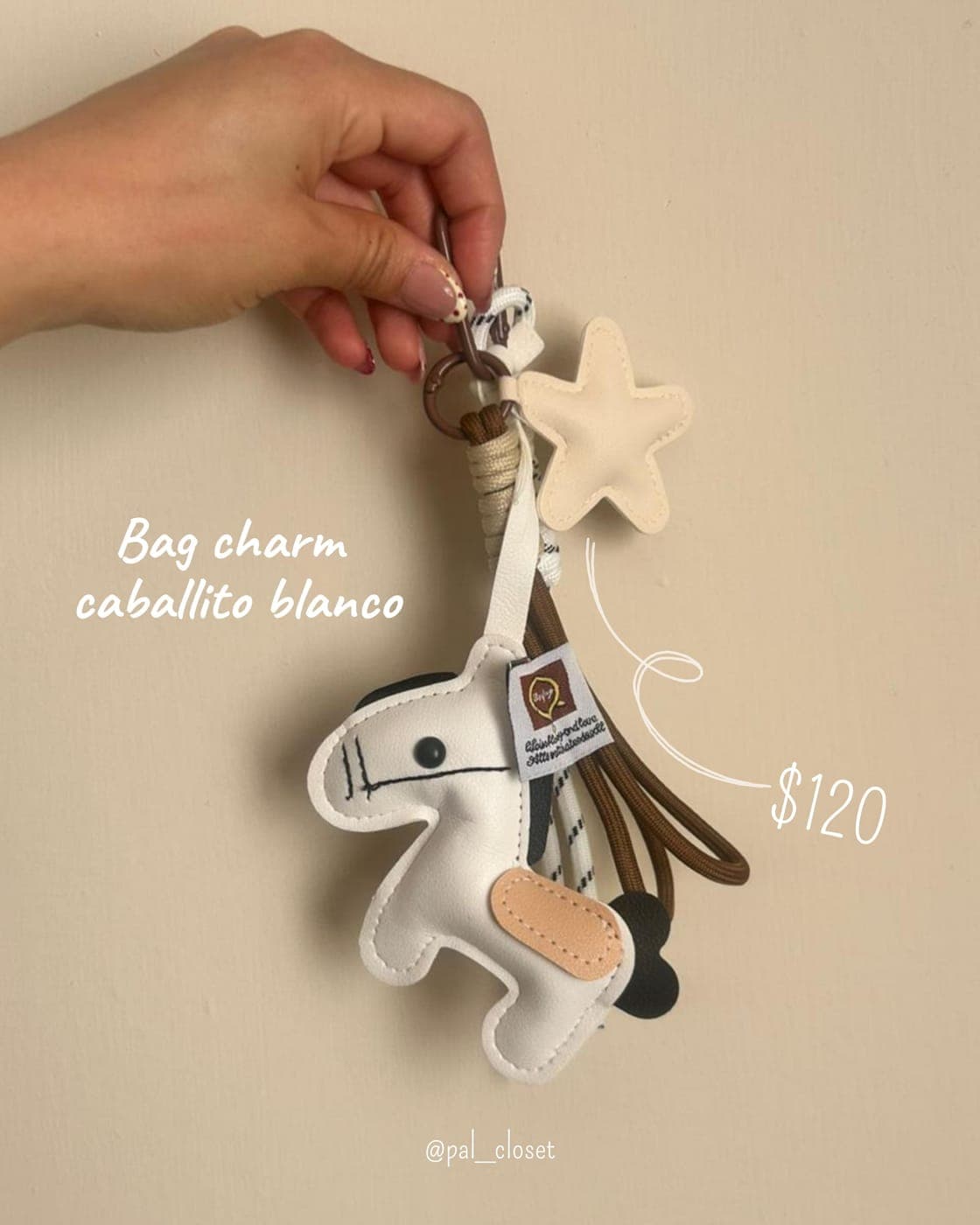 Bag charm caballito blanco